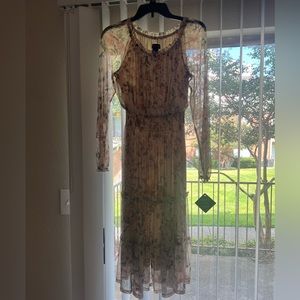 Women’s midi length mesh dress with cream underlay